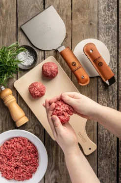 Aplastador de hierro con protección en asa Kockums, acero inoxidable-neopreno