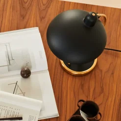 Lámpara de mesa Kaiser Idell 6631-T Luxus latón, negro mate