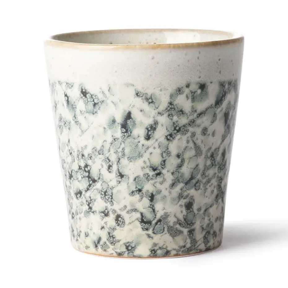 Taza 70's, Hail
