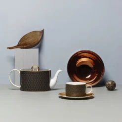 Tetera Arris, accent