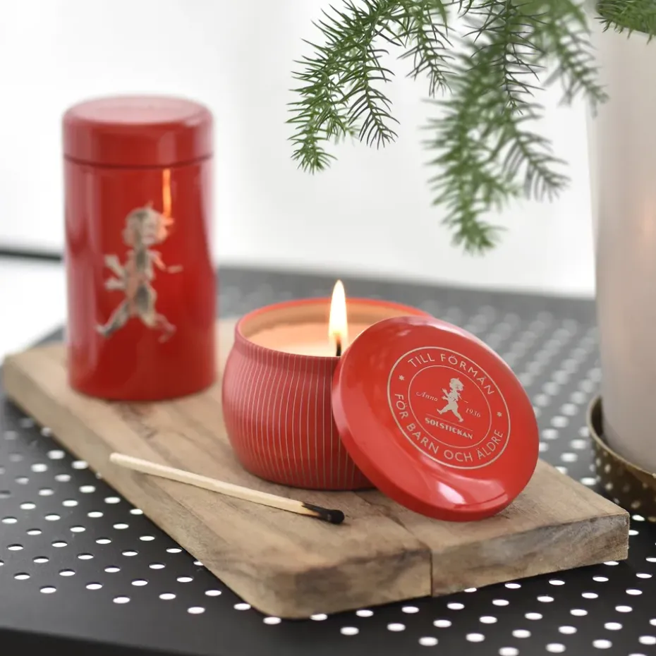 Vela aromática Solstickan 25 h, Rojo-canela y naranja