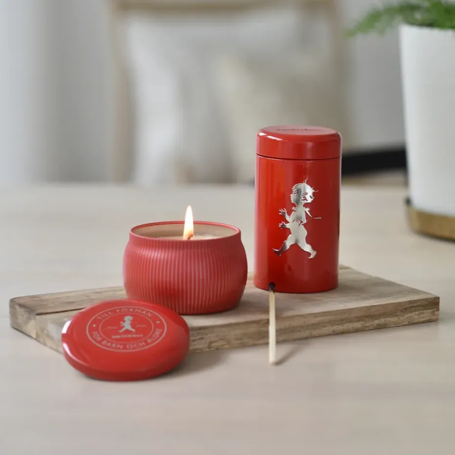 Vela aromática Solstickan 25 h, Rojo-canela y naranja